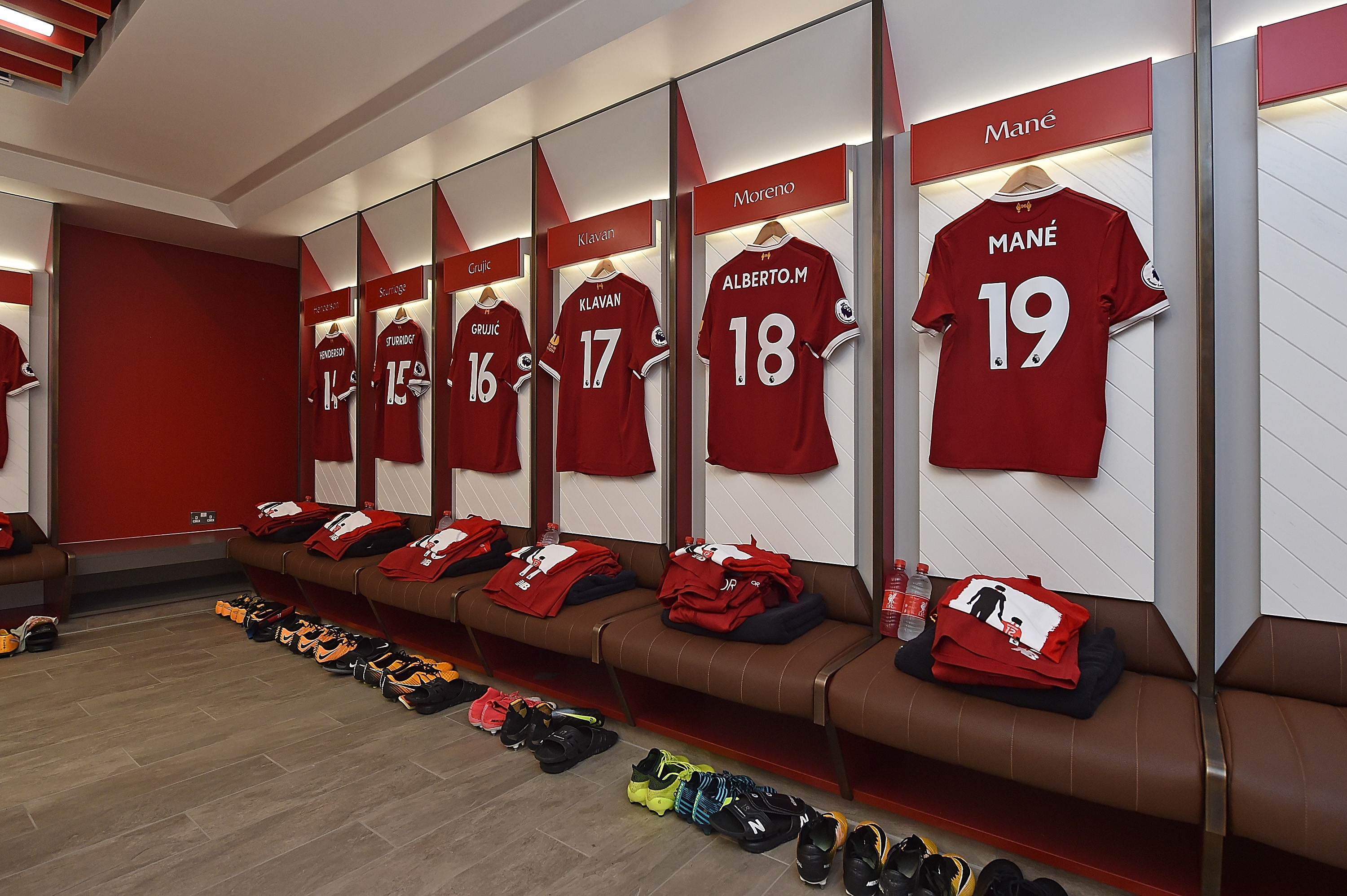 Liverpool shirts hanging in the locker room
